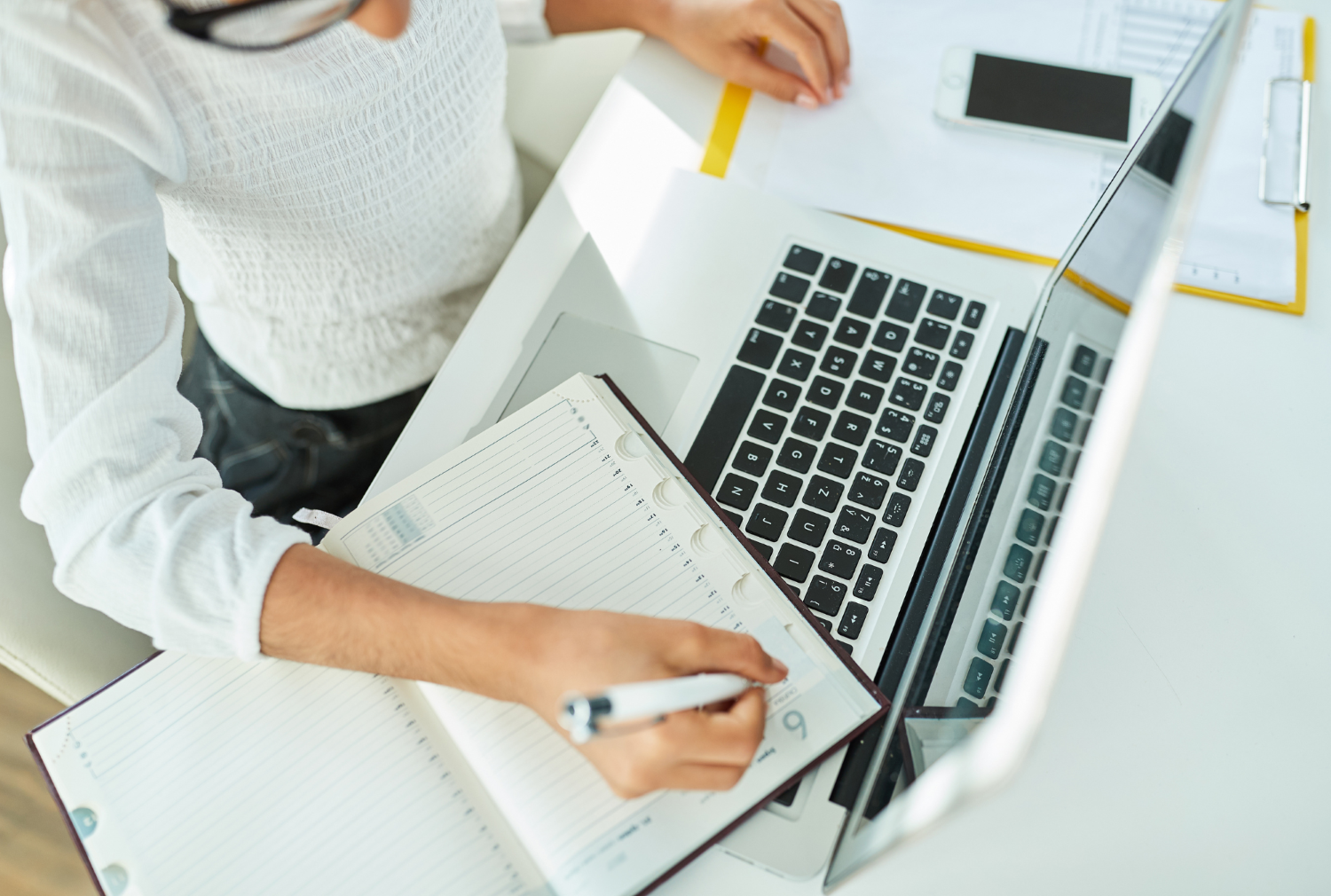 Female at computer | August Real Estate Made Easy: Let Me Handle the Details